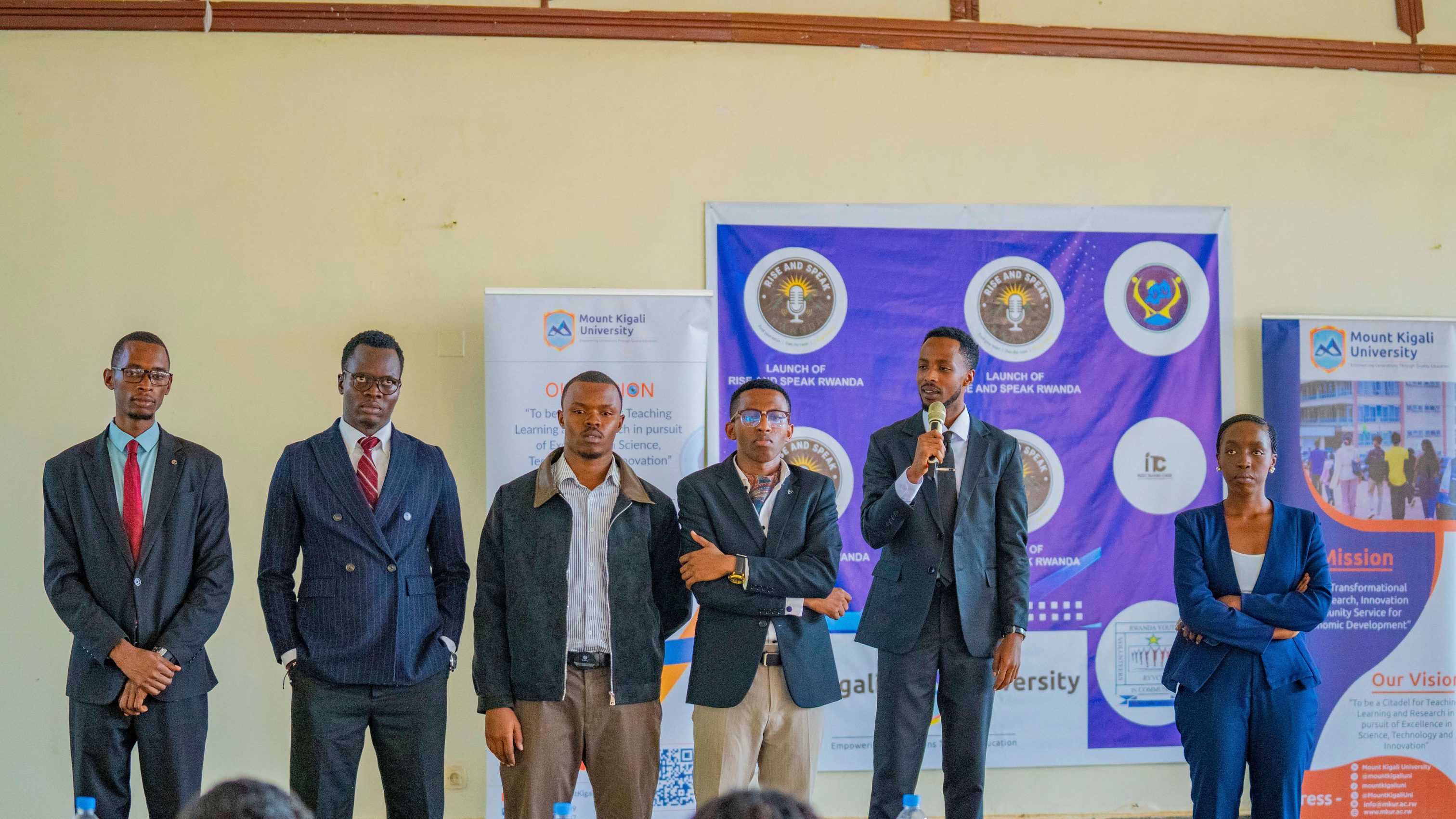 Mount Kigali University student mentors pose together during the Rise and Speak Rwanda outreach session at Apebu Nyamata High School, demonstrating their shared commitment to youth mentorship, leadership development, and empowering students to communicate confidently.