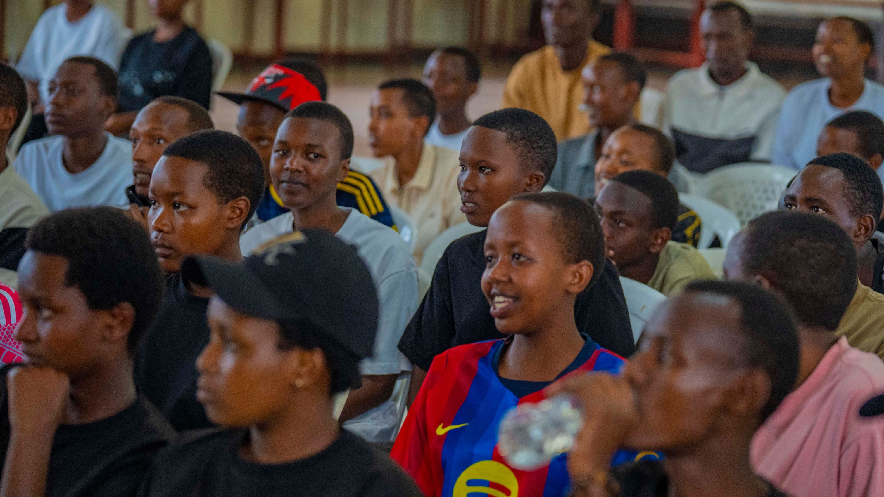 High school students attentively follow the mentorship session, gaining insights into effective communication, personal development, and the importance of expressing their ideas with confidence